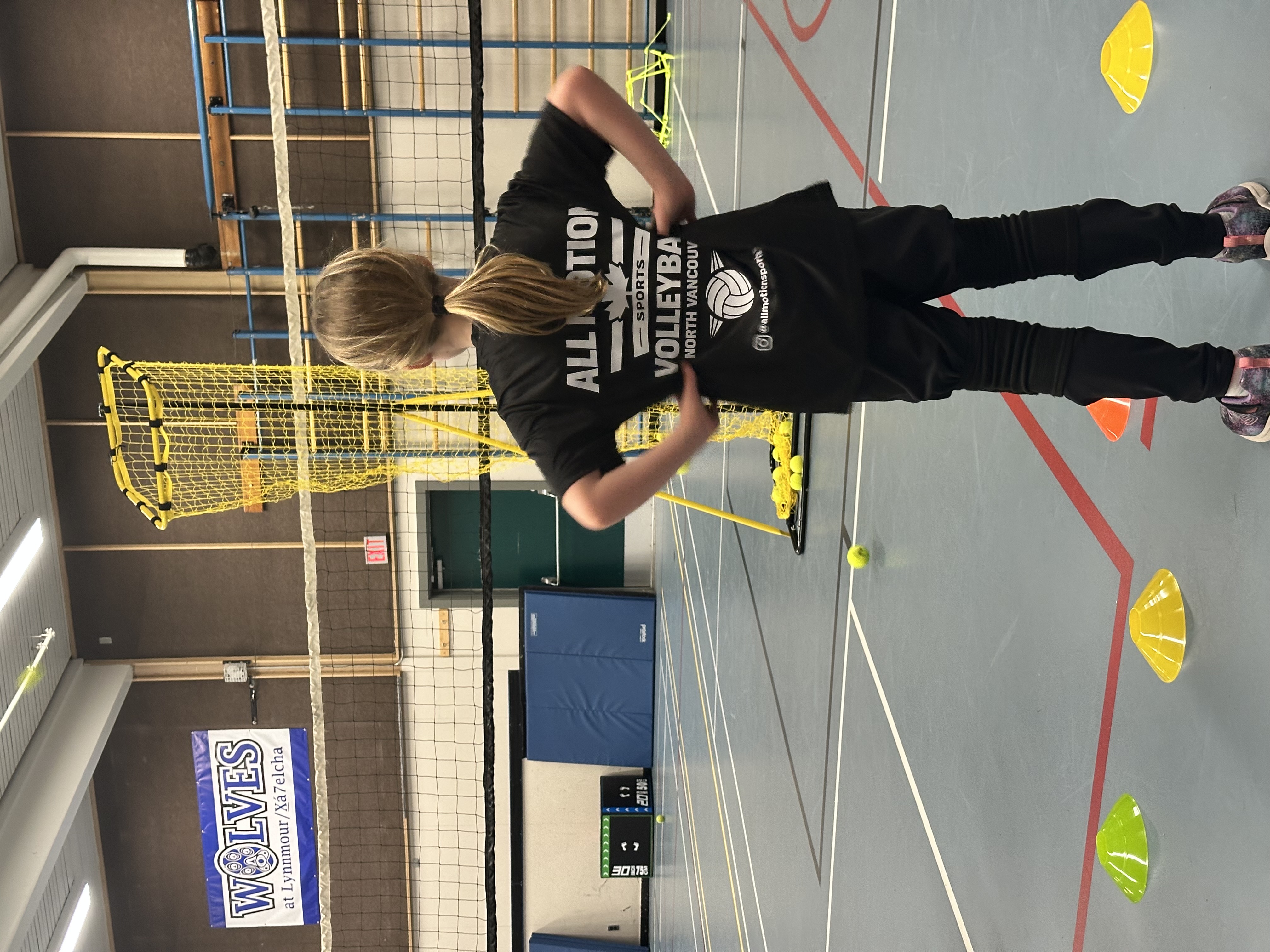 Youth volleyball practice at All Motion Sports